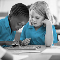 school children on tablet